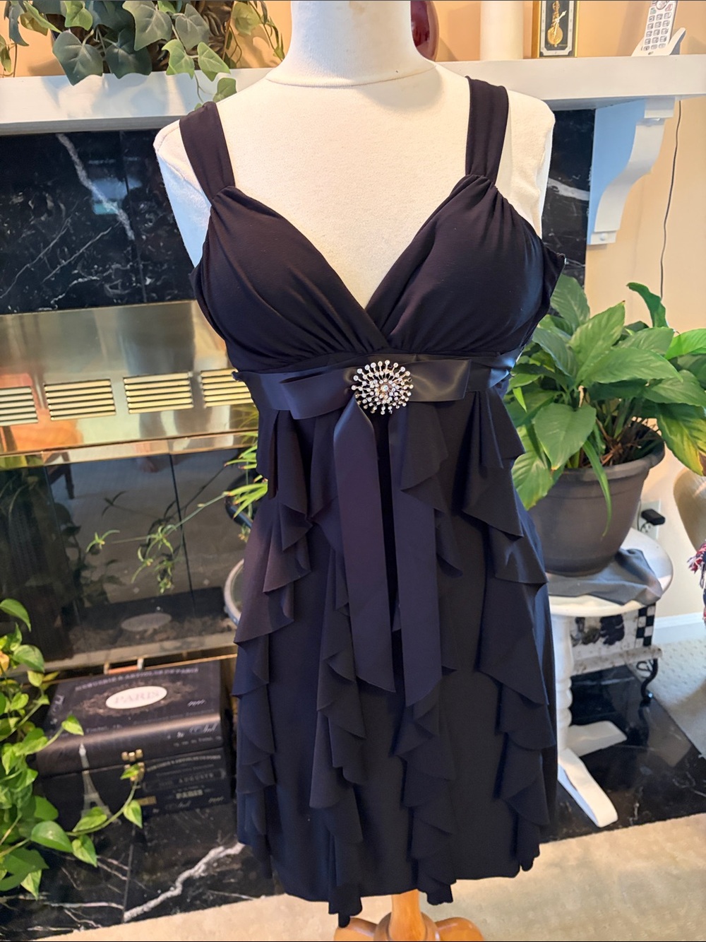 Black Ruffled V-Neck Mini Dress with Satin Waist and Brooch